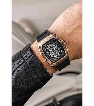 Мъжки часовник в златисто и черно снимка