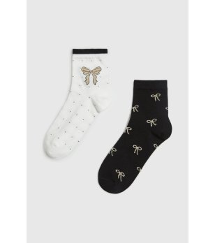 Комплект дамски чорапи в бяло и черно с панделки снимка